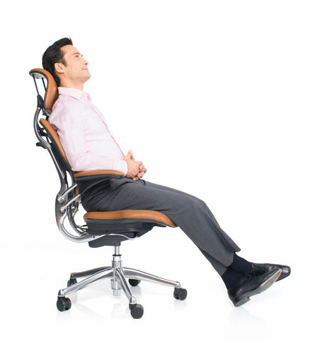 relaxed man sitting on the humanscale freedom office chair