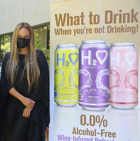 Tyra Banks posing for H2O Sonoma Soft Seltzer with 0.0% Zero Alcohol
