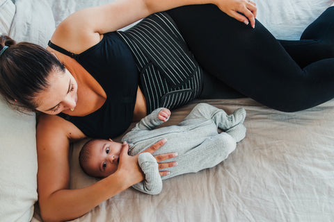 mom-with-baby-in-bed