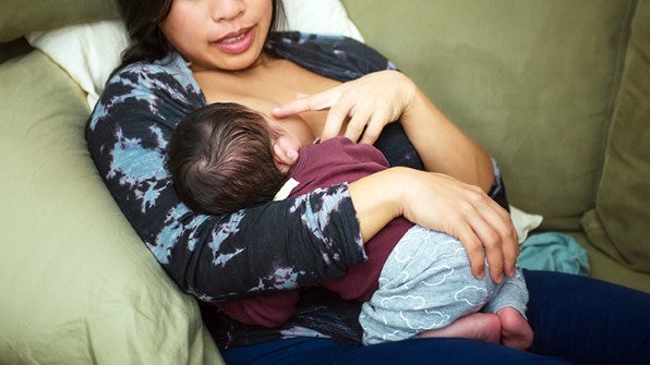 breastfeeding-positions-laid-back-2020-722x406
