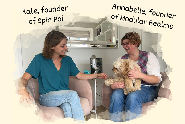 a picture of Annabelle (founder of modular realms) sat chatting with Kate (founder of Spin Poi) talking about our businesses