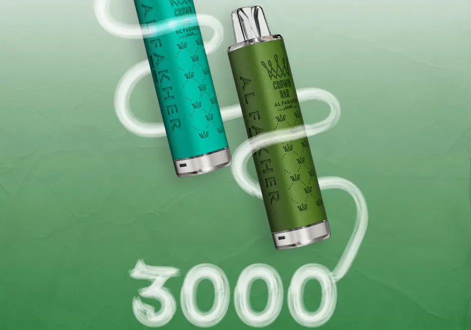 Close-up of two Al Fakher Crown Bar Mini 3K vapes in teal and green with a glowing "3000" puff count in white
