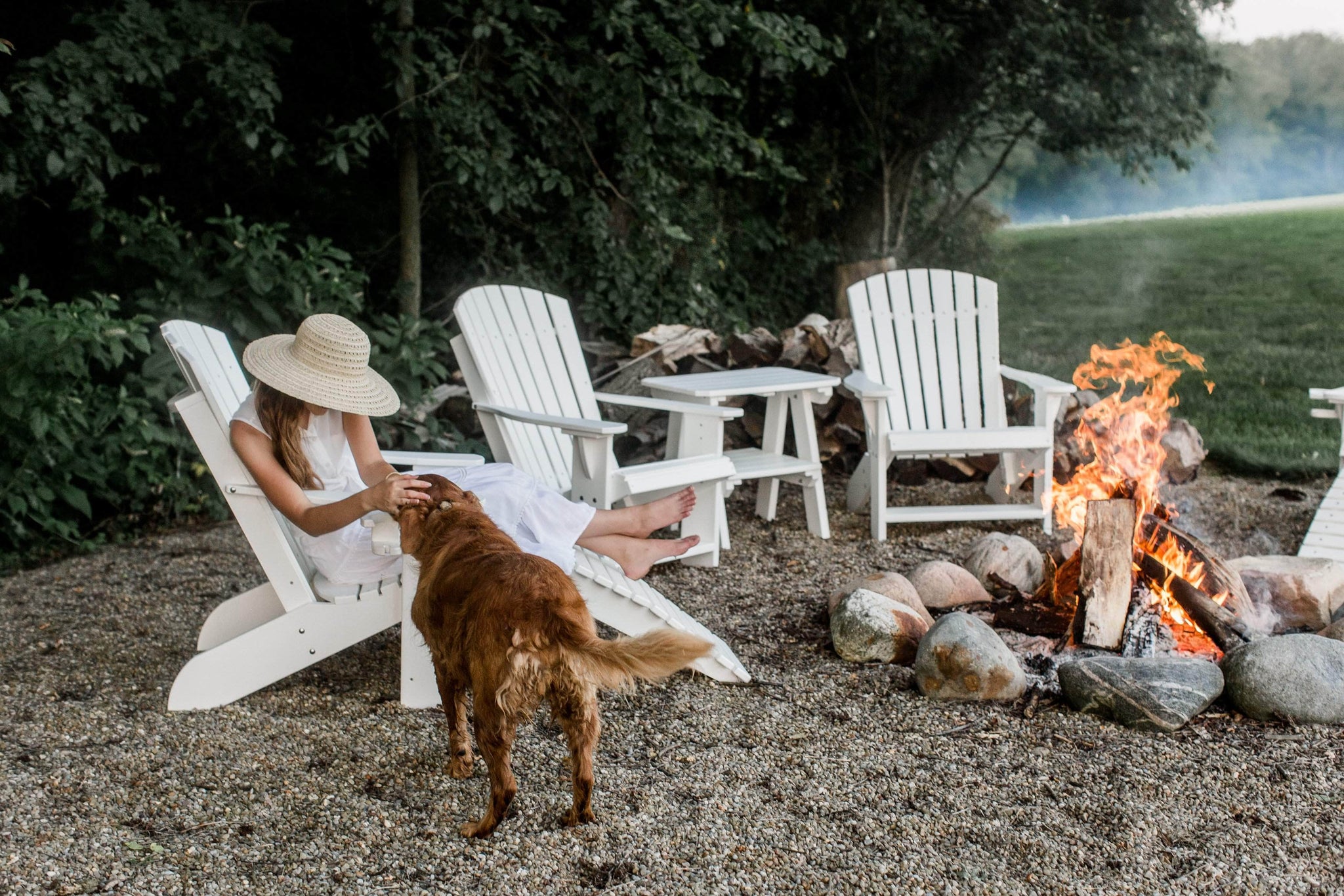 poly adirondack chairs around campfire