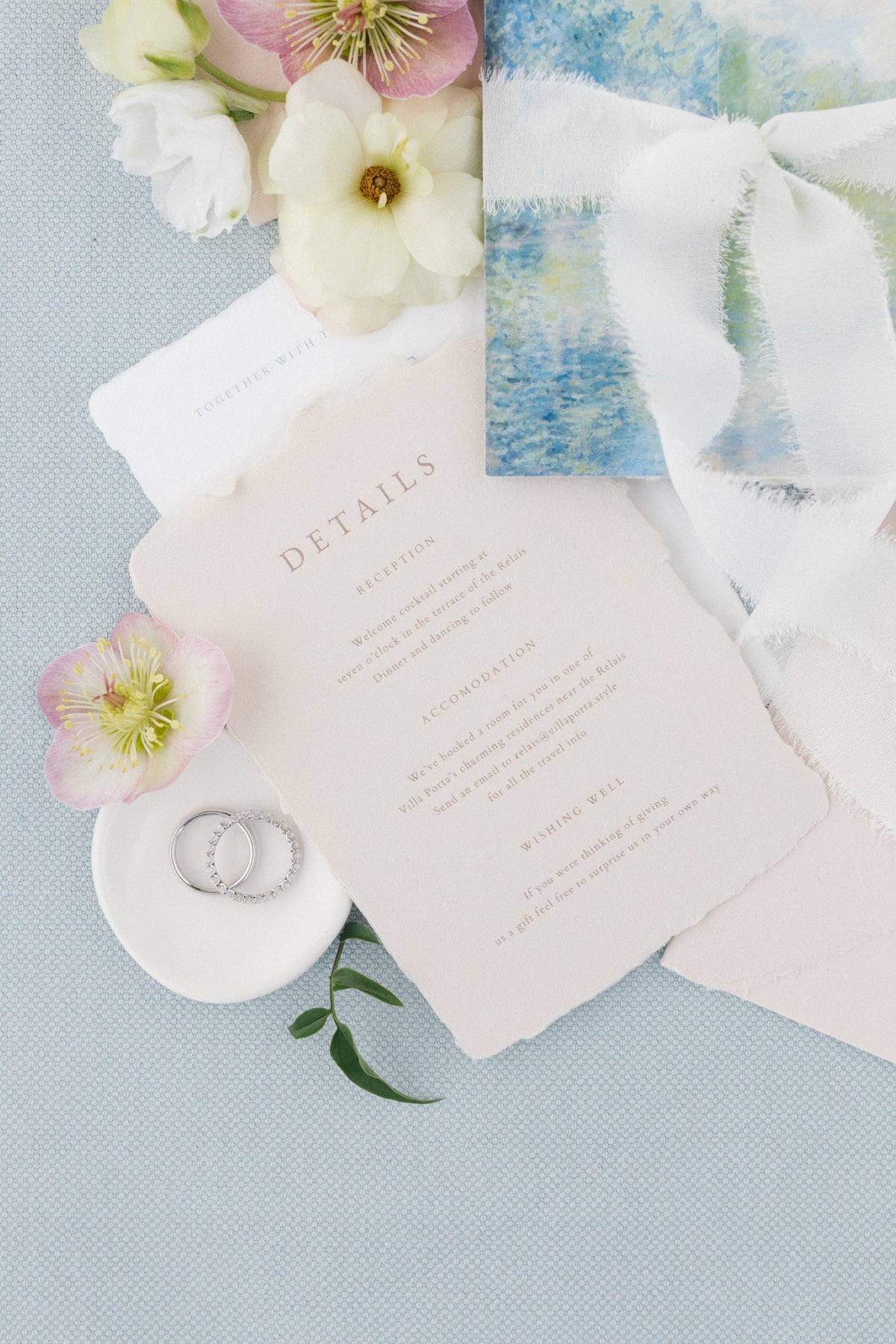 Close-up of handcrafted wedding invitations showcasing the beauty of handmade paper