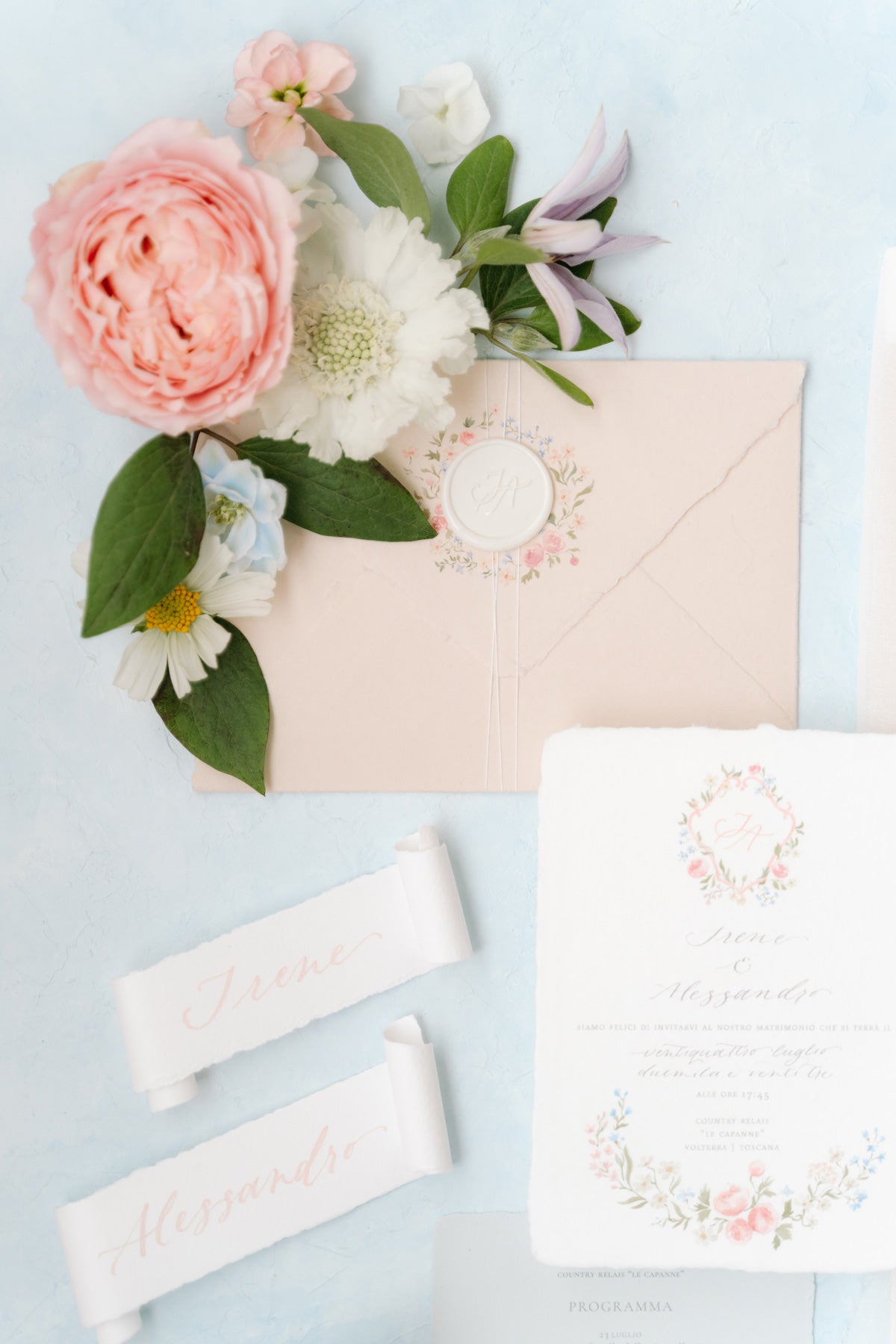 Elegant wedding invitation suite featuring calligraphy on handpicked handmade paper, a perfect blend of tradition and modernity