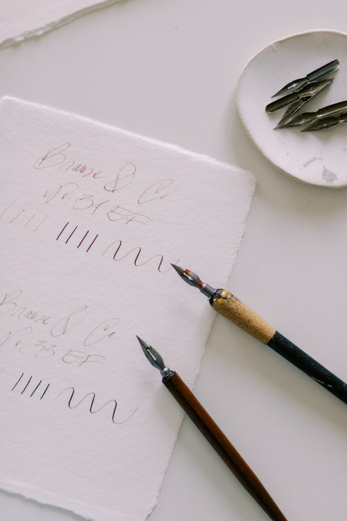 Achieve elegant calligraphy results with Brause & Co No. 31 EF nib on handmade paper.