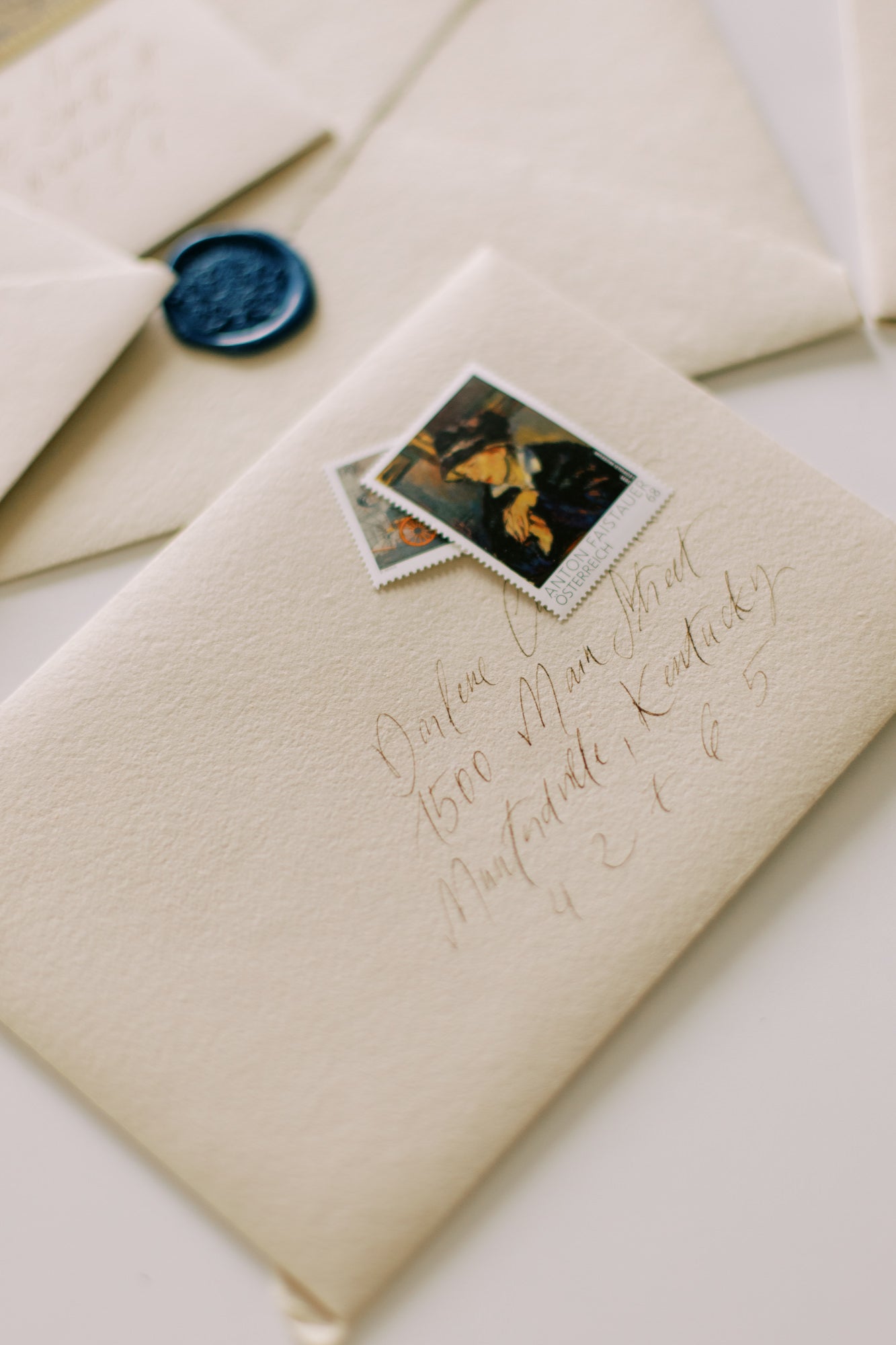 Hand-canceling postage: the perfect companion for your luxurious handmade paper, ensuring pristine delivery.