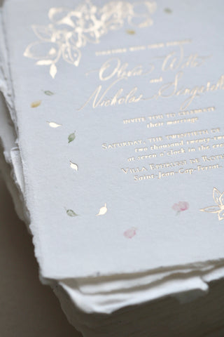 Discover the beauty of hot foil printing on handmade paper for your wedding invitations. Expert insights and captivating designs await!