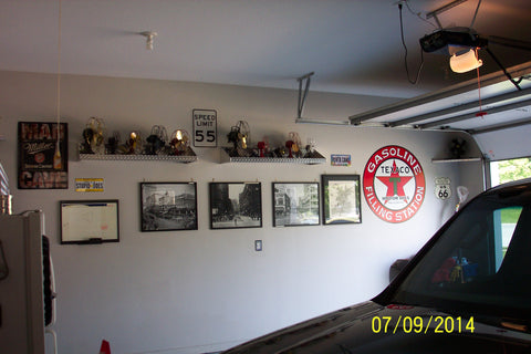 man cave garage outfitted with Pit Products diamond plate wall shelves