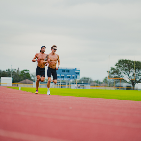 Endurance Athletes running on track