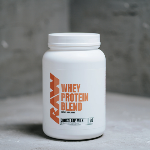 A white tub of RAW whey protein blend