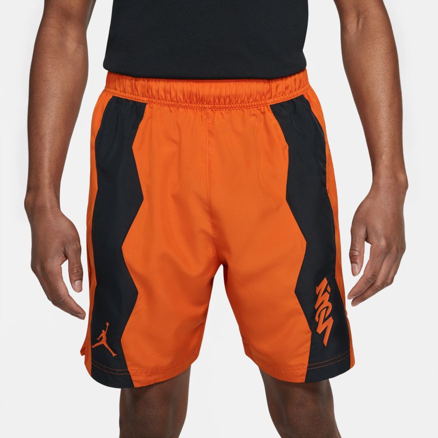 black and orange jordan shorts