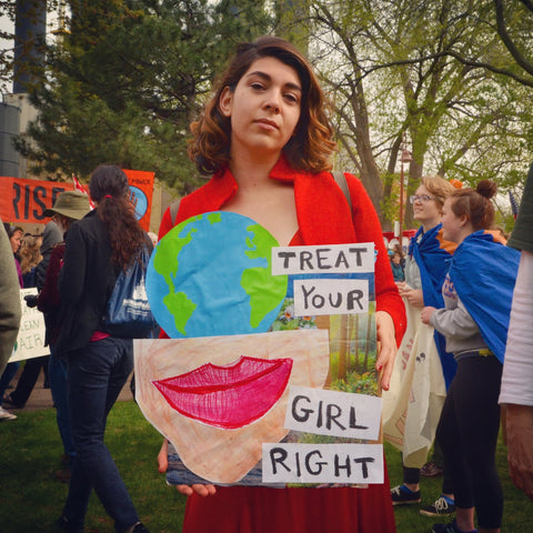 CEO & Founder, Zoe Levin, Holding Protest Sign at Climate March