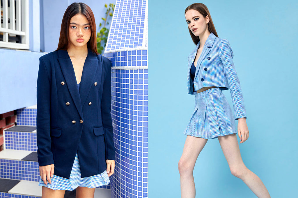 (Left) A young woman sports a navy blue, oversized blazer and light blue skirt. (Right) A tall brunette woman poses in a light blue gingham co-ord, featuring a boxy crop blazer and tennis skirt