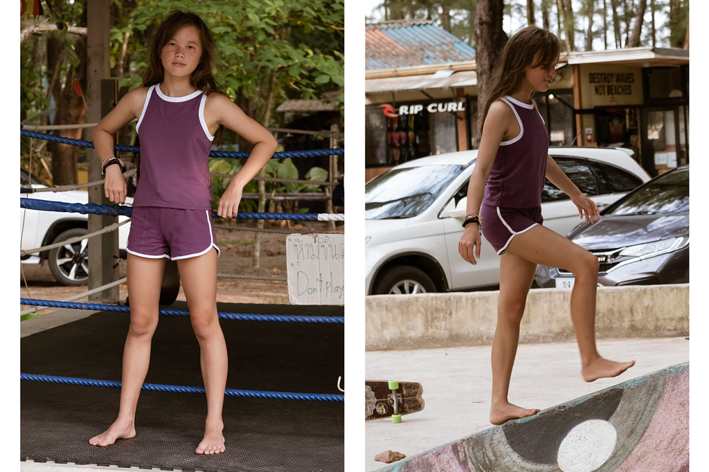 Tween girl wears purple retro tank top and sports set with contrast piping by Gen Woo.