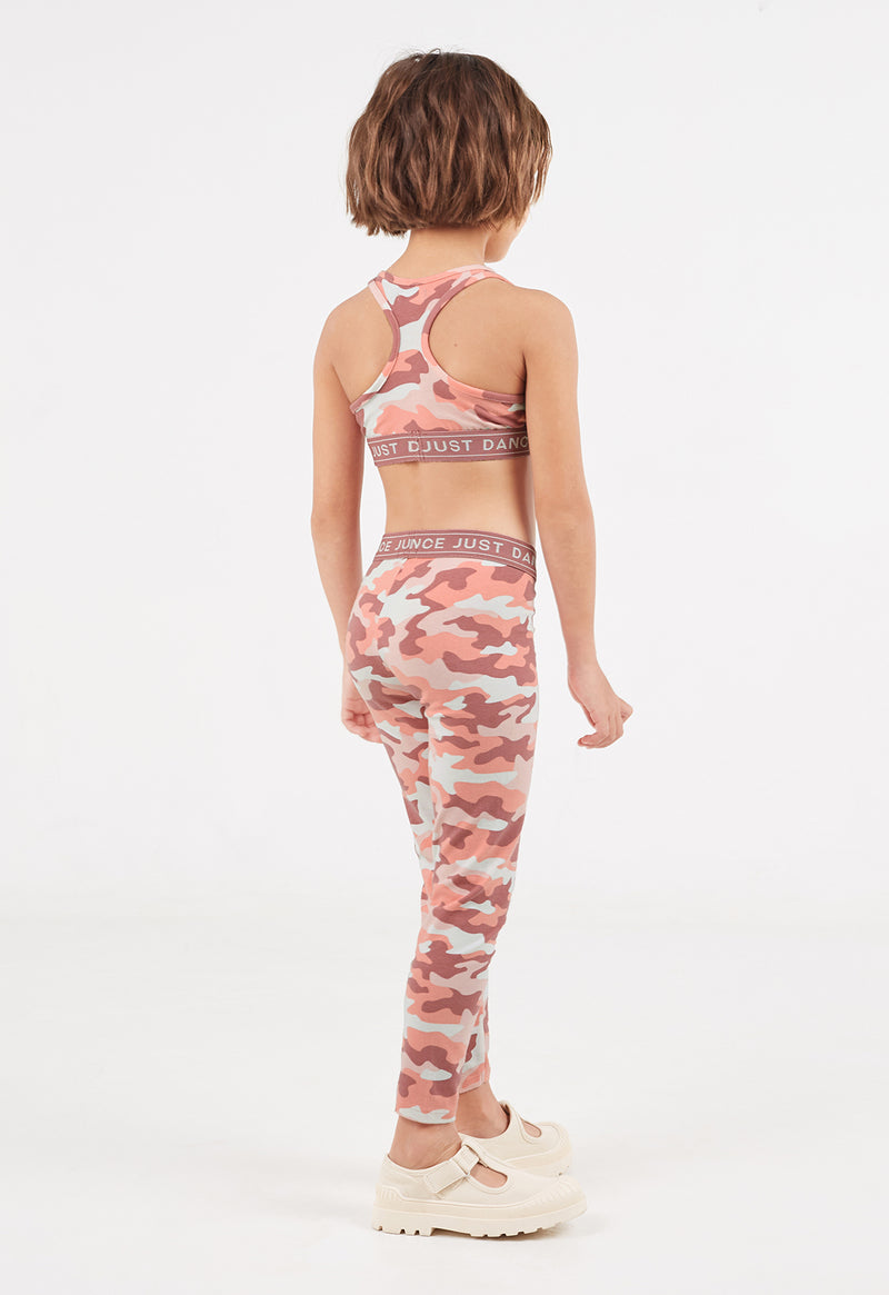Girls Crop top by Gen Woo. Our crop top features “Just Dance” slogan elastic trim at the hem along with racer back design. The camouflage print crop top has washed out effect. Please note that each washed out garment will have colour shade variation. – Back view