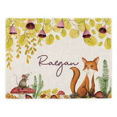 Placemats featuring a nature design with a fox and mouse.