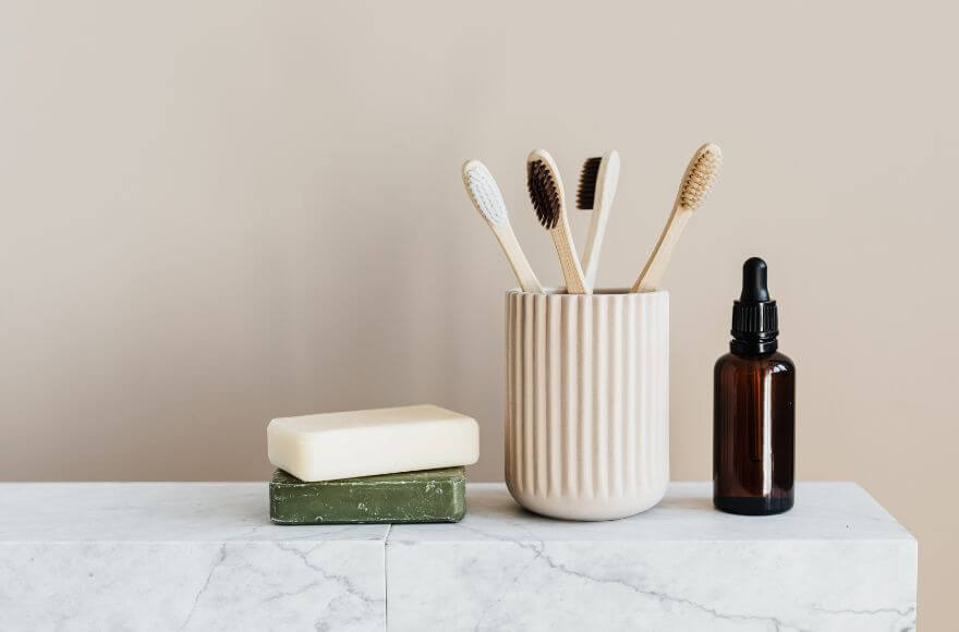 Set of natural nonpolluting toiletries on marble table