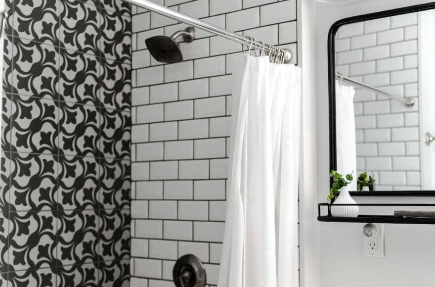 Black and white shower cubicle.