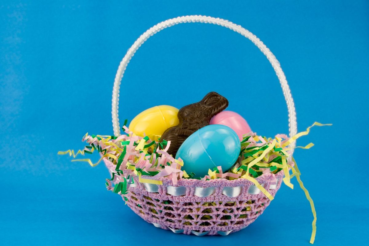 easter basket with colourful easter grass