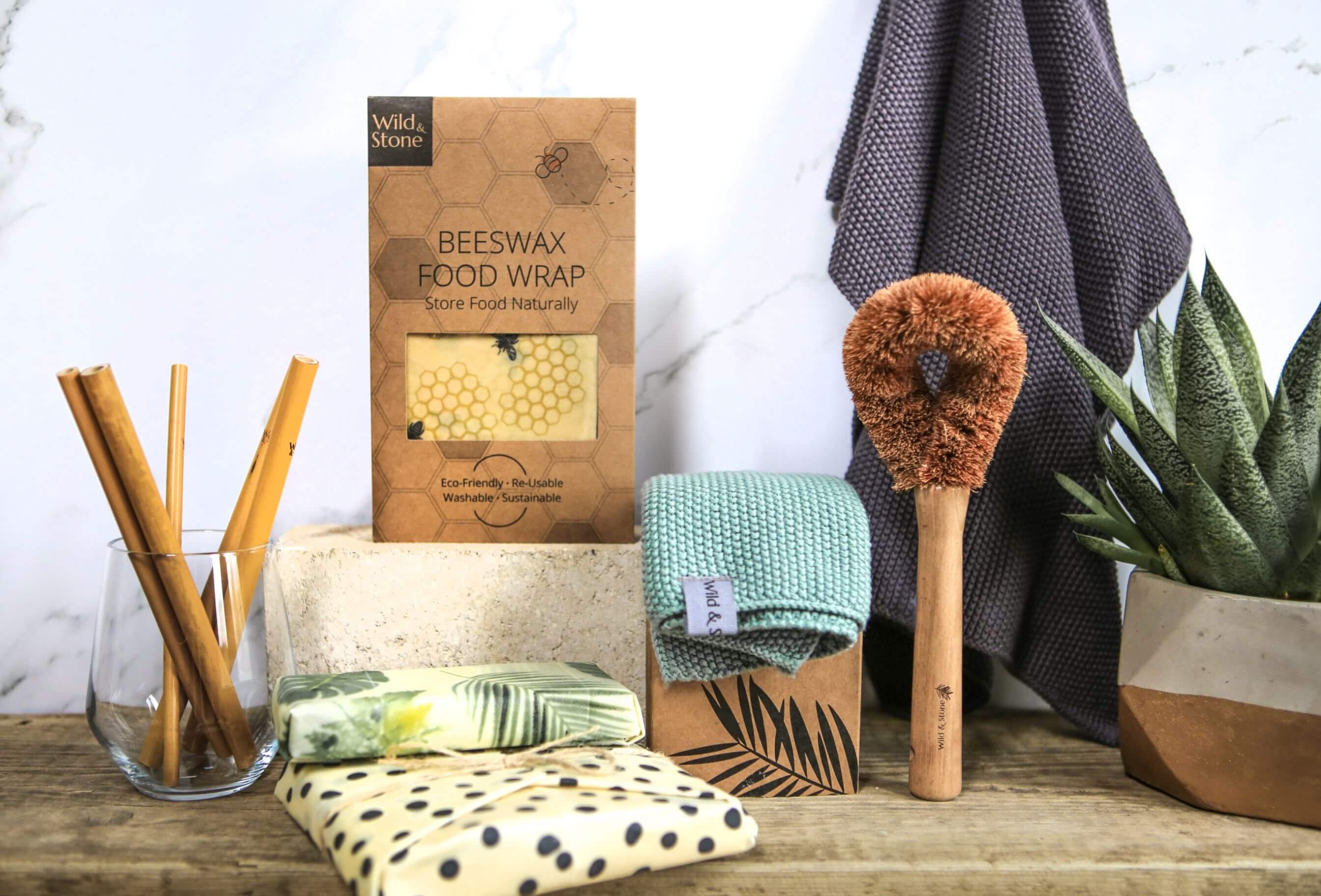 Coconut fibre dish brush sitting amongst other zero waste swaps.