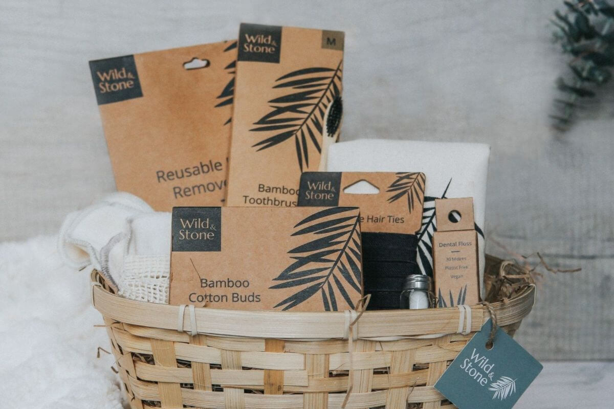 Wid & Stone toiletry hamper overflowing with eco essentials for low-waste living.