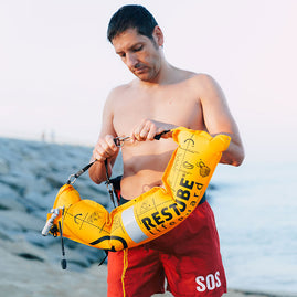 Restube reflector used by lifeguard for more visibility