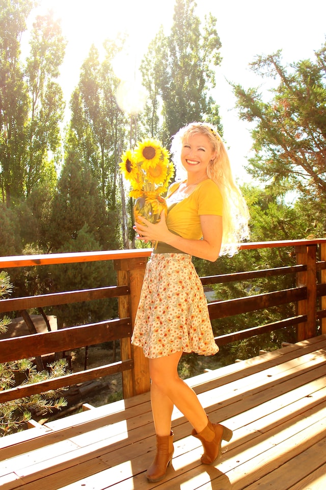 happy woman with sunflowers