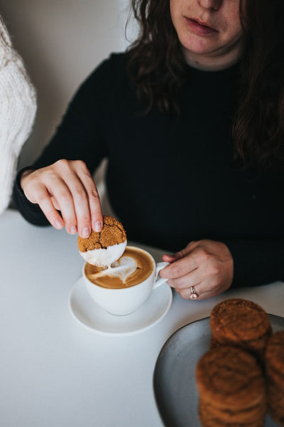 woman eating cookie with mindfulness