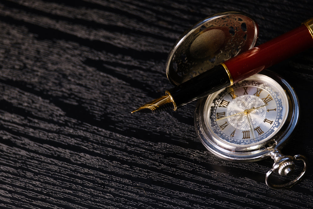 Beautiful pocket watch and fountain pen