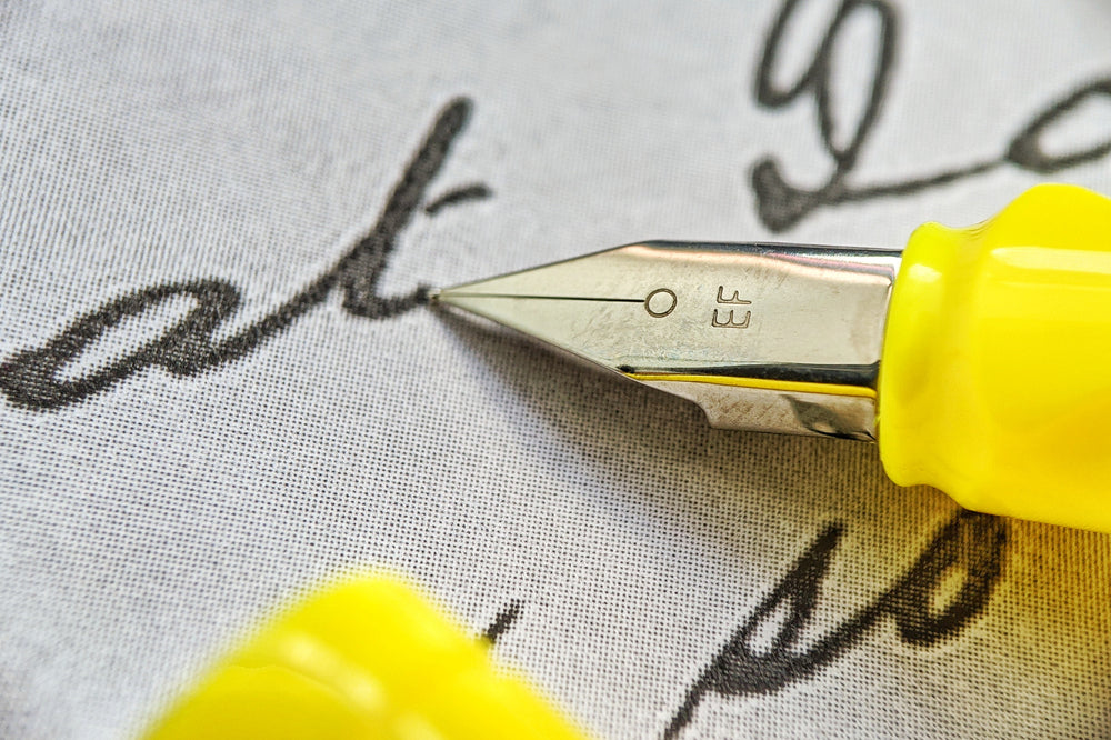 Fountain pen on an vintage handwritten letter