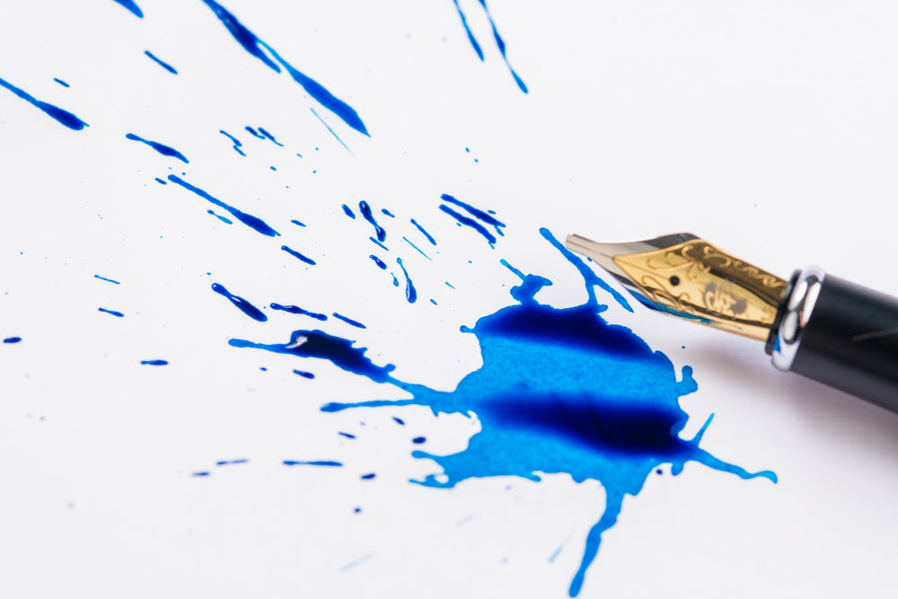 fountain pen ink making a spatter