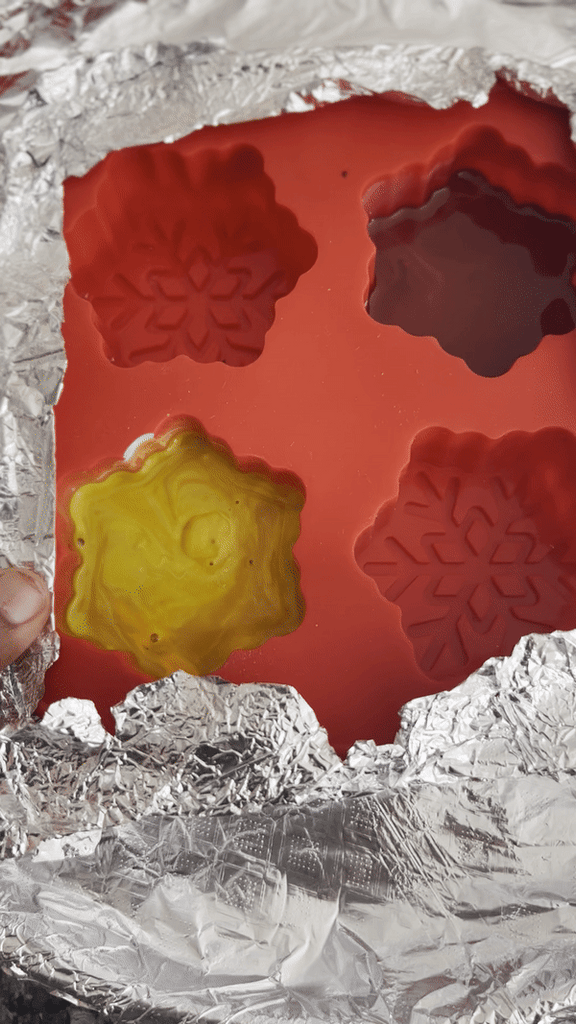 GIF of melted crayon wax in a silicon mold