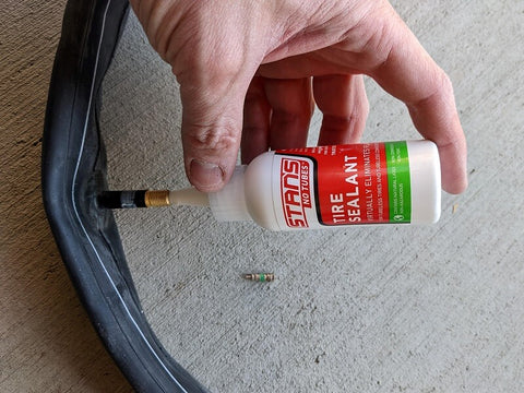 Stan's sealant squeezed into bike tube to prevent flats