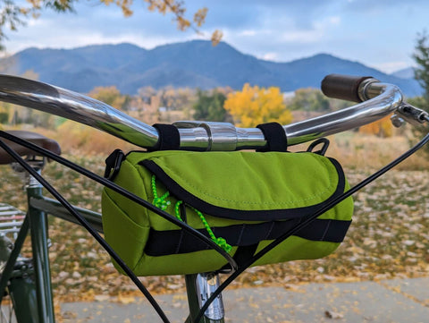 Ski Lime Green Handlebar bag with mountain backdrop