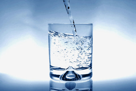Drink plenty of water when having alcohol to improve your sleep afterwards