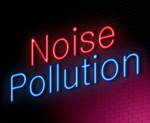 Sleeping in noisy environments, neon light sign saying noise pollution