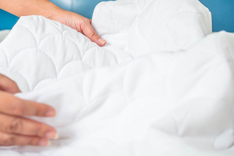 How should you wash your comforter, hands on comforter
