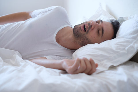 How to stop mouth breathing while sleeping, man sleeping with open mouth