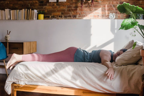 Trying Progressive Muscle Relaxation every night will promote sleep, woman relaxed on bed