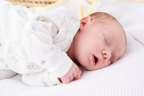 Why do newborns sleep so much