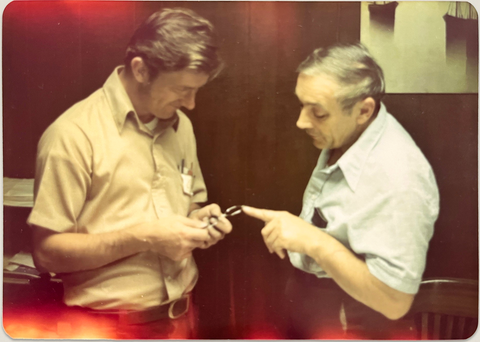 Stan and Jan Randolph, the founders of Randolph Engineering, inspect Aviator sunglasses frames.