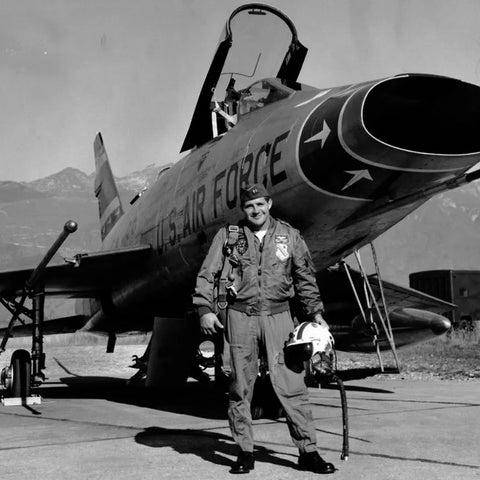 Vintage Image of a Military Fighter Pilot outfitted in an Alpha Industries Bomber Jacket