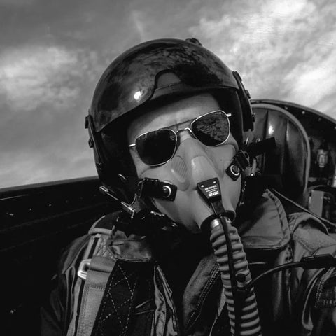 Military Fighter Pilot in a stylish pair of Randolph's Matte Chrome Military Aviators