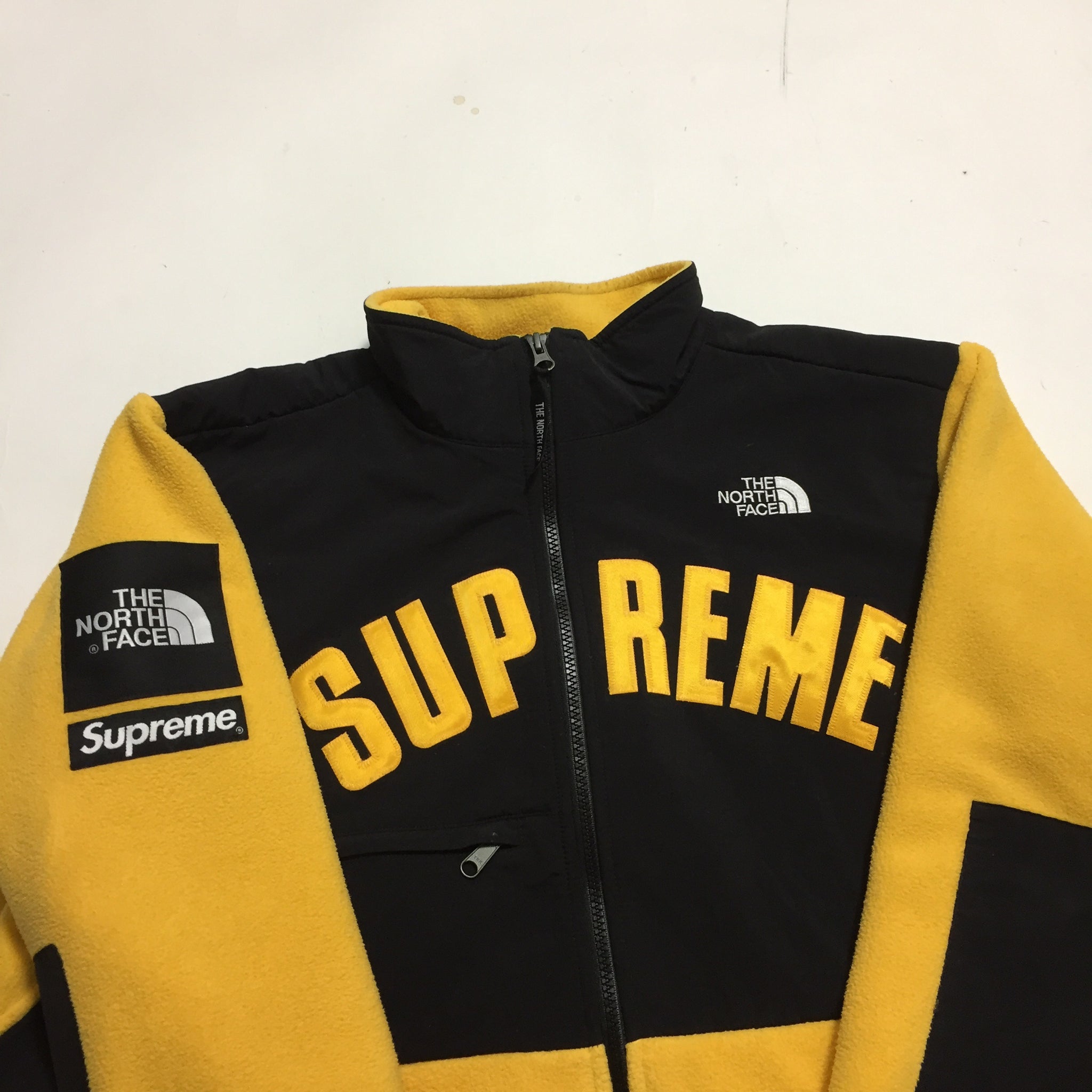 supreme x the north face yellow jacket