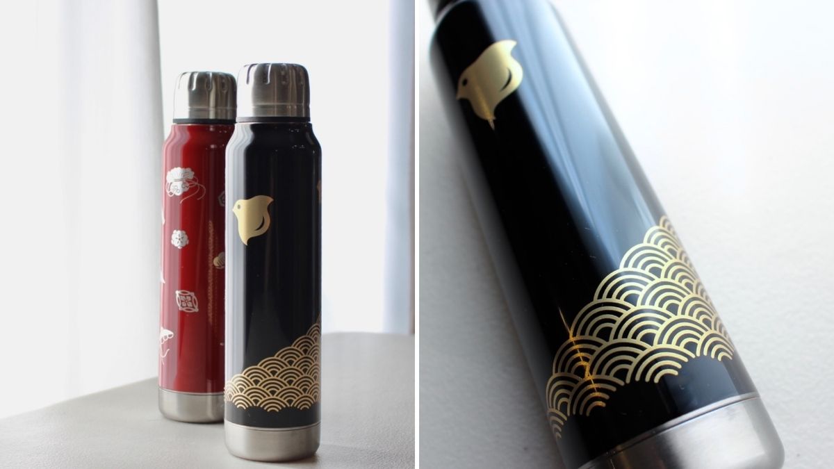 Water bottle with golden lacquer pattern on black color