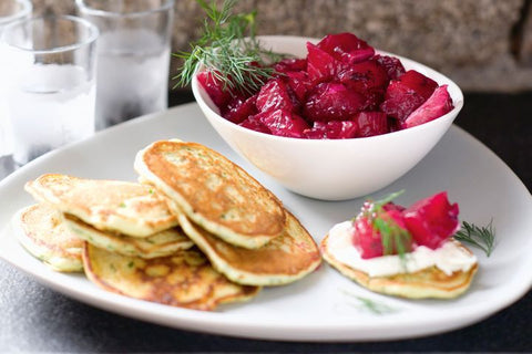 beetroot and vodka cured salmon with watercress pancakes