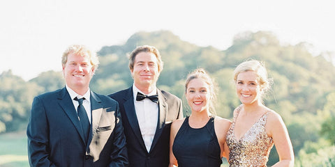 wedding guests wearing black ties 