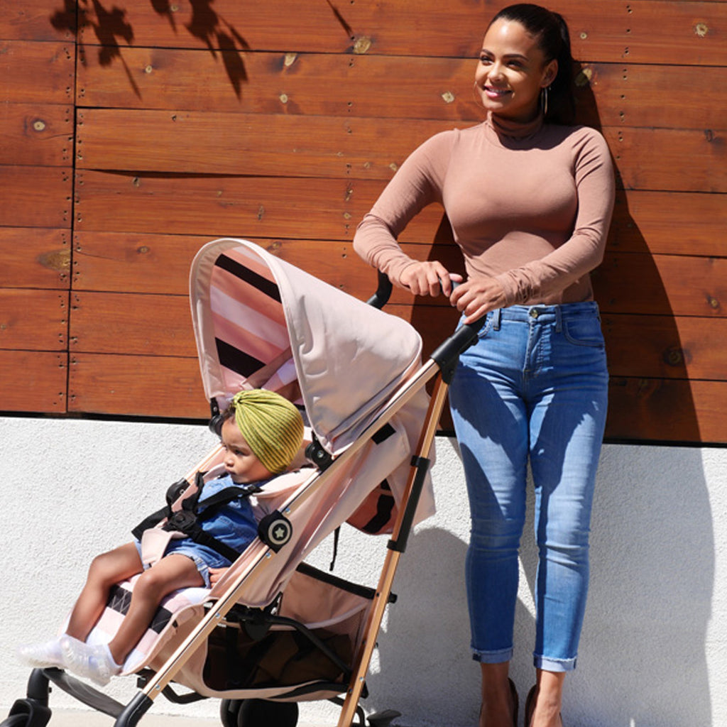 pink and rose gold stroller