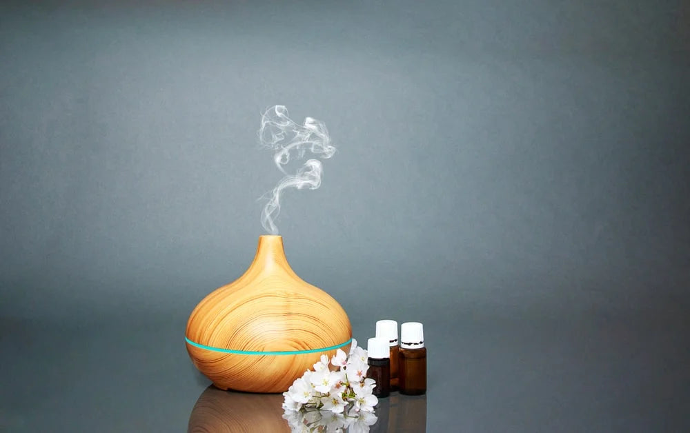 electric aroma diffuser and essential oils